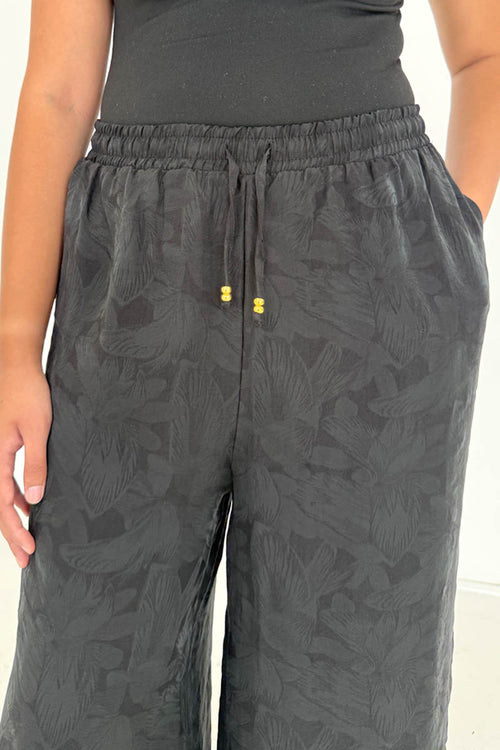 RELAXED WIDE LEG TROUSERS